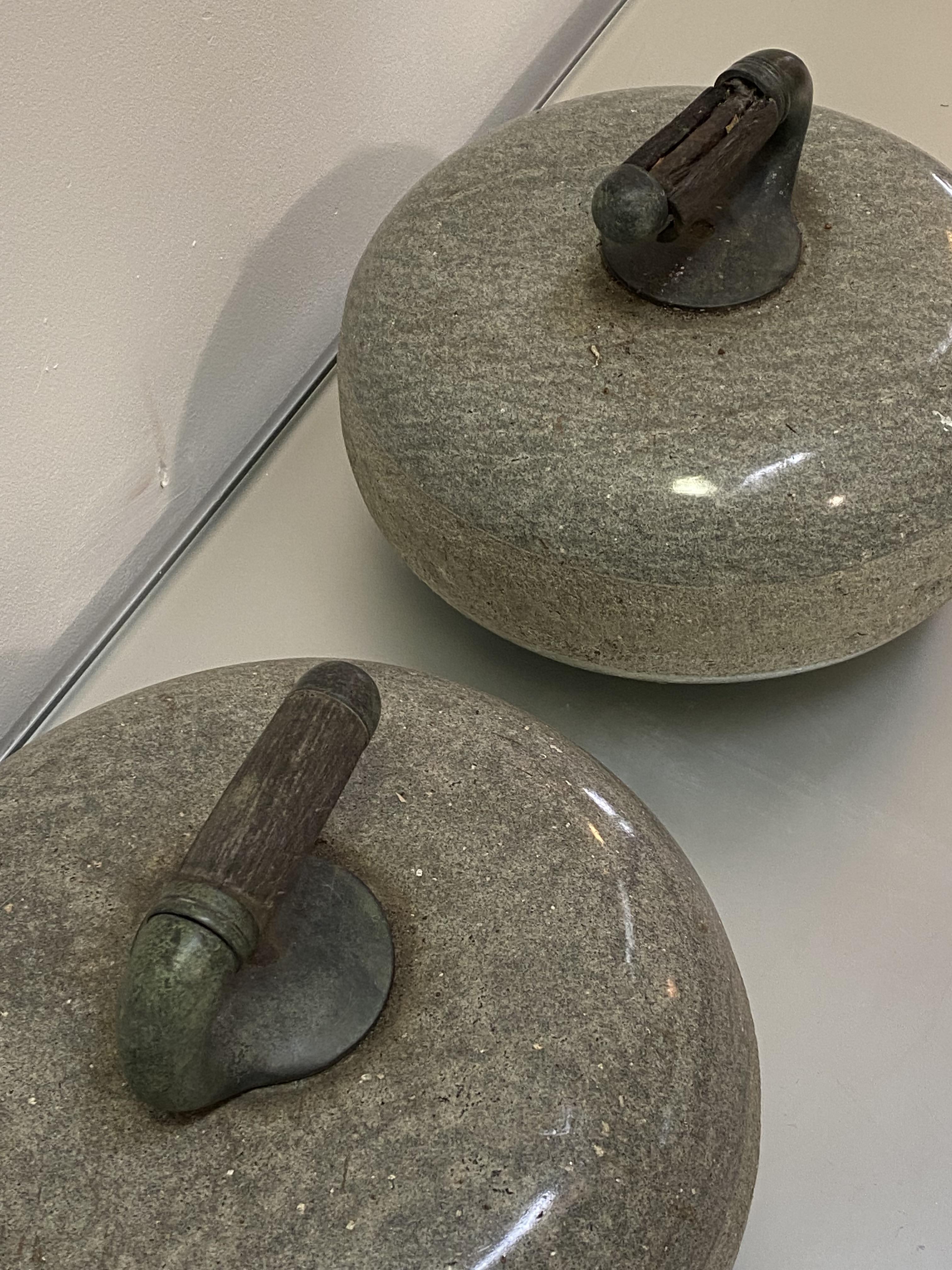 A pair of granite curling stones, each with wooden-inset handle (wood distressed). Diameter 27cm - Image 2 of 2