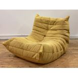 Michel Ducaroy for Ligne Roset, a Togo lounge chair, upholstered in yellow suede, H76cm, W84cm,