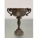 Luen Wo, Shanghai, a Chinese silver twin-handled cup, chased with dragons, floral cartouches and