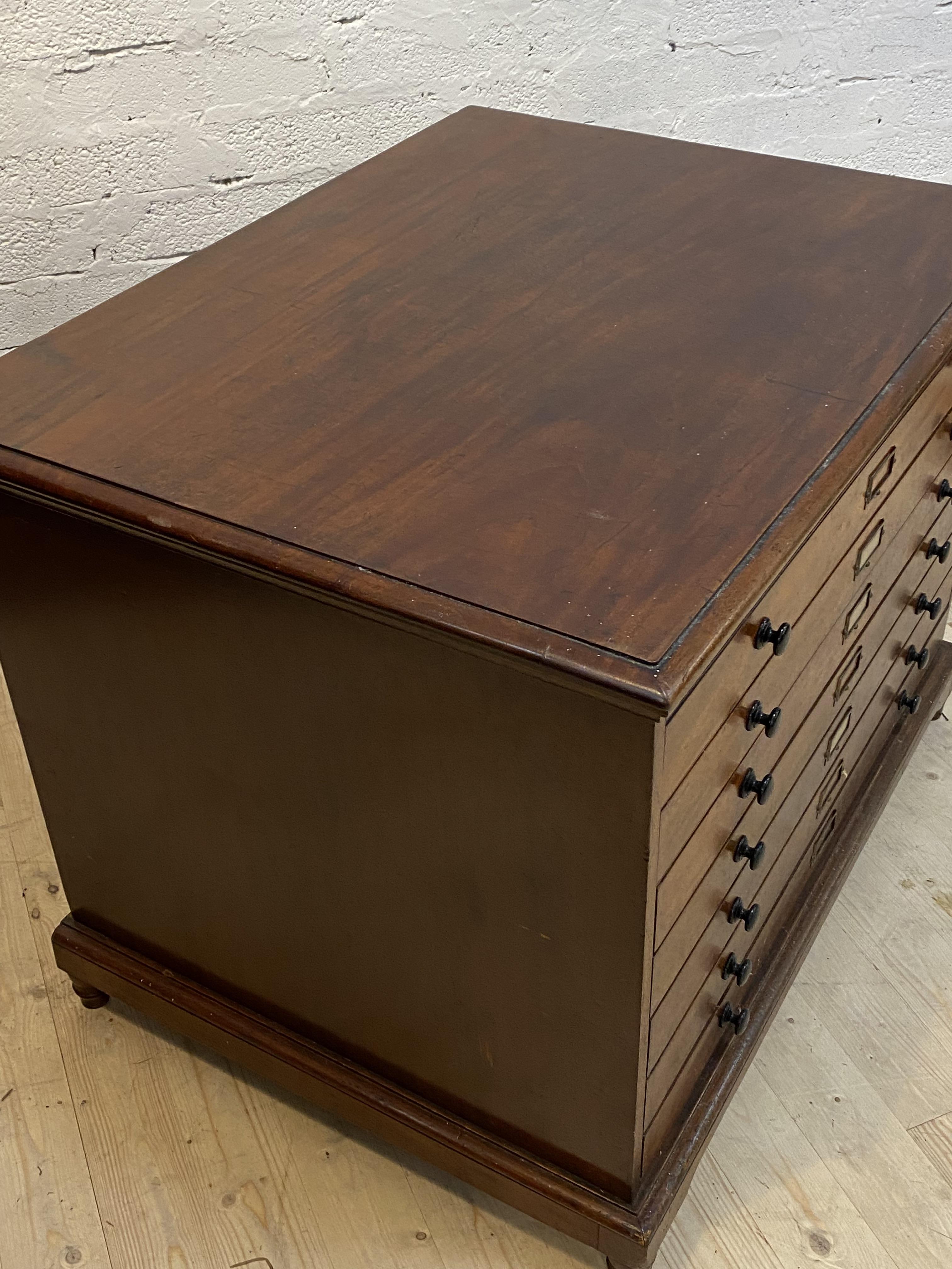 A late 19th century mahogany plan chest, the moulded top over seven drawers, each with ebonised pull - Image 2 of 4