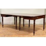 A William IV mahogany extending dining table, comprising two 'D' form ends and two leaves, the top