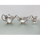 A Victorian Scottish silver three piece tea service, Samuel Weir, Edinburgh 1850, each piece of