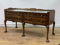 Whytock and Reid, a mahogany double buffet, early 20th century, the quarter sawn veneered top with