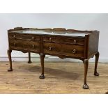 Whytock and Reid, a mahogany double buffet, early 20th century, the quarter sawn veneered top with