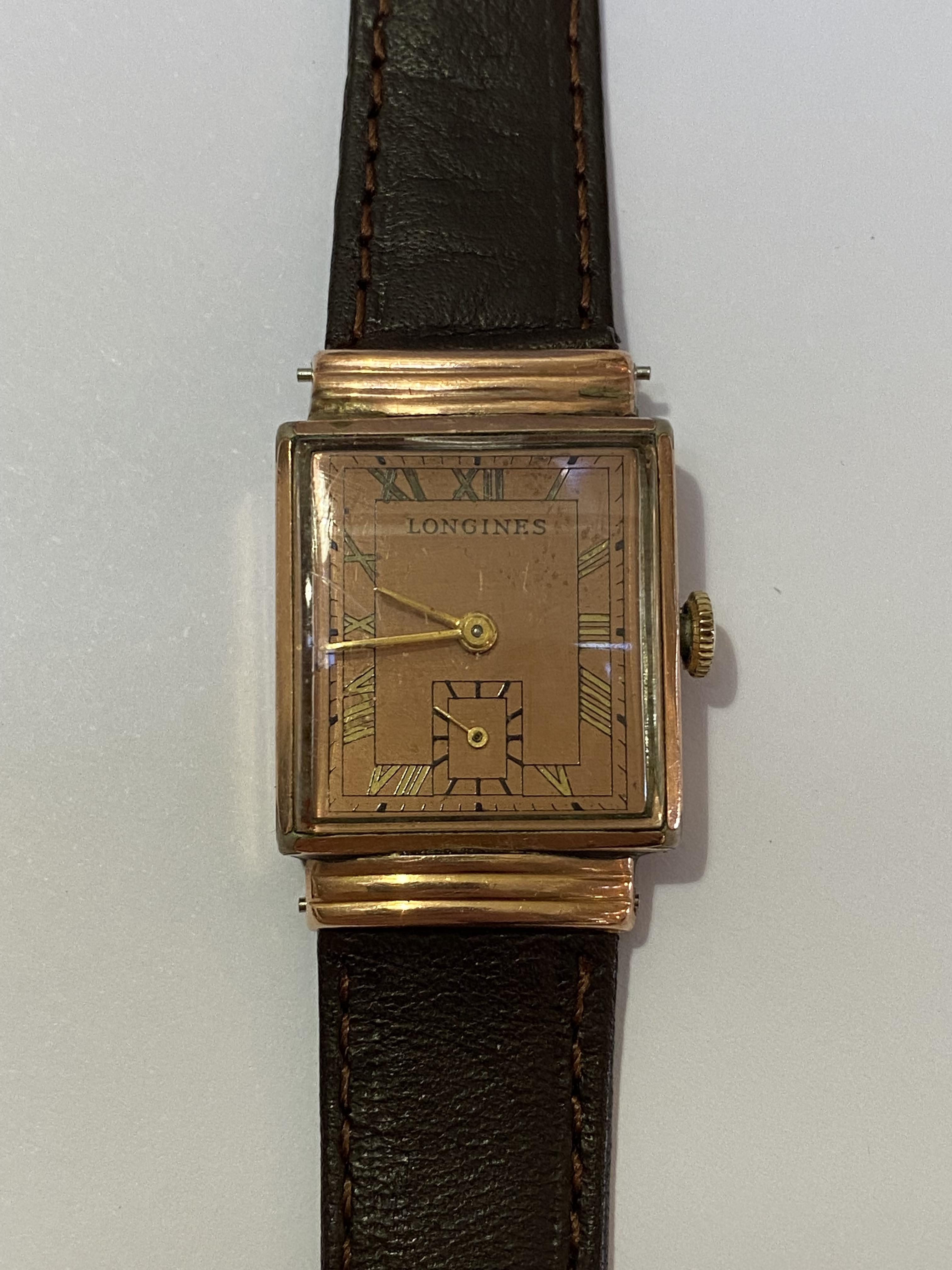A Longines 10k gold-filled gentleman's wristwatch, c. 1930-40, the rectangular copper finish dial