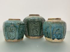 Three Chinese Provincial green-glazed pottery jars, each of hexagonal form, the largest with moulded