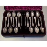 A cased set of twelve Victorian silver teaspoons with tongs, Elkington & Co,. Birmingham 1889,