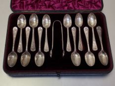 A cased set of twelve Victorian silver teaspoons with tongs, Elkington & Co,. Birmingham 1889,