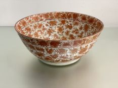 A Chinese Export Sacred Bird and Butterfly pattern iron red / orange punch bowl, 19th century,