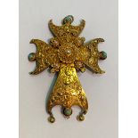 A 19th century Maltese cross pendant, worked in unmarked yellow metal with filigree work, set with