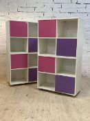 A pair of contemporary white laminate cube shelves, with contrasting coloured doors, H140cm,