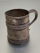 A London silver Christening mug, 1915, with engraved letters, A.D.S and B.D.S. 1980 and 1943, with C