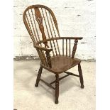 A 19th century elm and ash Windsor chair, the double hoop, spindle and splat back over saddle