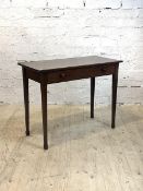 A Georgian inlaid mahogany side table with frieze drawer, raised on square tapered supports,