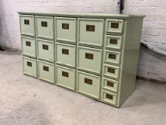 An late 19th century green painted hardwood haberdashers shop fitting, fitted with twelve drawers