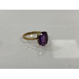 An 9ct gold oval amethyst set ring, size N, weighs 3.17 grammes