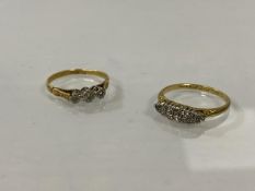 Two 18ct gold diamond rings, one with navette shaped setting with multiple chip diamonds, one with