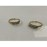 Two 18ct gold diamond rings, one with navette shaped setting with multiple chip diamonds, one with