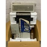 An Amstrad PCW 8256 personal computer word processor with keyboard, monitor, built in disk drive and