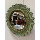 A 1930s green and gilt circular convex mirror with carved sunburst style frame (mirror: d.19cm