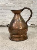 A large 19th century copper 5 gallon jug, with two handles and brass plate, H51cm