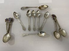 A set of six silver coffee spoons, Edinburgh 1895, makers mark WM, with spiralled stems and initials