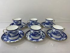 A set of six early 20thc Royal Crown Derby demi tasse cups and saucers in chinoiserie blue and white