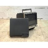 A vintage Sony solid state portable TV with plastic cover and carry handle, H31cm