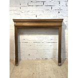 An early 20th century moulded oak fire surround with plain frieze, H136cm, W141cm, D19cm, (