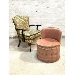 A George III style mahogany elbow chair, the upholstered shield back over scrolled open arms and