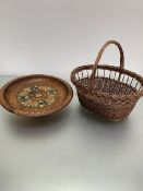 A wicker egg basket with loop handle to top (37cm x 38cm) and a Swiss treen carved musical fruit