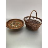 A wicker egg basket with loop handle to top (37cm x 38cm) and a Swiss treen carved musical fruit