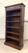 A mahogany floor standing open bookcase, the projecting cornice over drawer and five adjustable