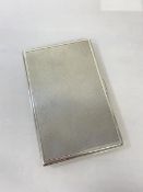 A 1958 hallmarked Birmingham silver cigarette case (13cm x 8cm) (182g)