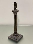 An Edwardian Epns Corinthian column oil lamp base on stepped square base, converted to