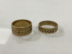 Two 9ct gold dress rings, with an angular designed exterior, one set with clear stones, size L,