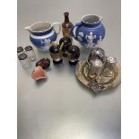 A Wedgwood style miniature jug with applied decoration, a parianware jug with applied decoration,