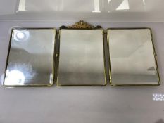 A triptych wall mirror in Neoclassical taste (when open: 32cm x 67cm)