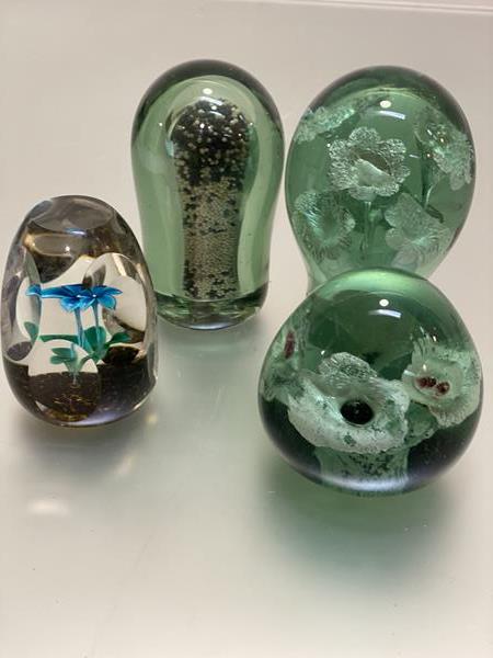 Group of 4 glass paperweights including three green glass dump (largest 13cm high), and another