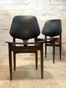 A pair of mid century teak dining chairs with vinyl upholstered seat and back, H80cm