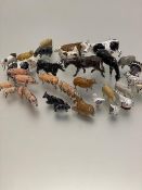 A collection of lead painted farmyard animals including Fresian and Hereford cows, Turkeys, Geese,