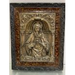 A Continental 19thc religious embossed brass plaque, The Sacred Heart, in arched panel flanked by