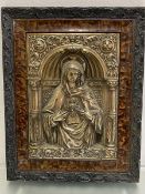 A Continental 19thc religious embossed brass plaque, The Sacred Heart, in arched panel flanked by