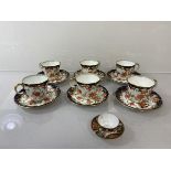 A set of six early 20thc Royal Crown Derby Imari palette demi tasse cups and saucers (cups: 5cm) and