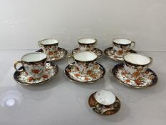 A set of six early 20thc Royal Crown Derby Imari palette demi tasse cups and saucers (cups: 5cm) and