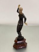 After Preiss, a bronze and resin and metal mounted Dancing Female Figure, on shaped polished agate