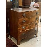 A 19th century cross banded mahogany bow front chest with four graduated drawers on splayed