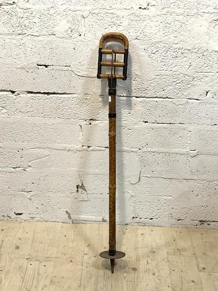 An early 20th century bamboo shooting stick with folding seat and iron spike, H91cm