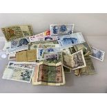 A quantity of banknotes, mostly European, including a 1920s German mark, Reichsbanknote (