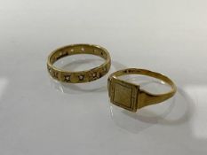 A signet style ring marked 9ct (M/N) and another Birmingham hallmarked 9ct gold ring (N) (